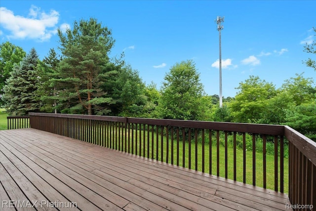 6893 Sanford Rd, Howell, MI 48855 - wooden deck featuring a yard