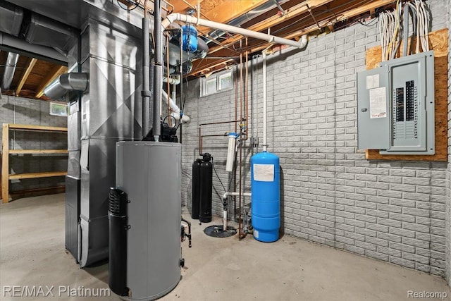 6893 Sanford Rd, Howell, MI 48855 - utility room featuring electric panel, water heater, and drainage system