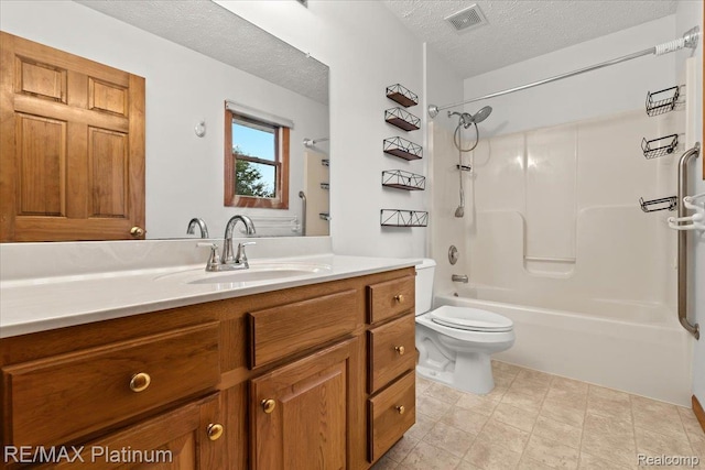 6893 Sanford Rd, Howell, MI 48855 - full bathroom with a textured ceiling, vanity, and shower / bath combination