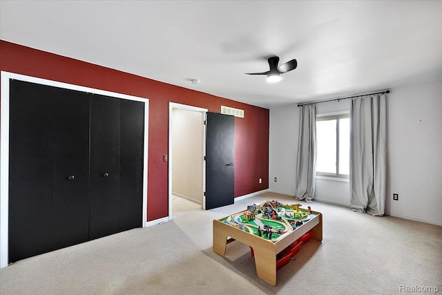 15924 Myrtle Dr, Macomb, MI 48042 - rec room with light carpet and ceiling fan