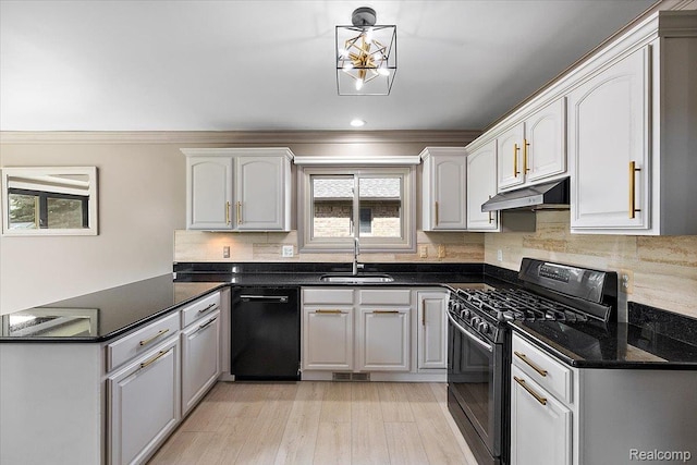 15924 Myrtle Dr, Macomb, MI 48042 - kitchen with black appliances, a peninsula, under cabinet range hood, dark countertops, and ornamental molding