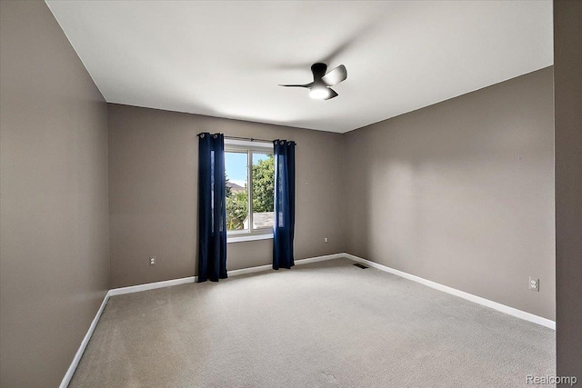 15924 Myrtle Dr, Macomb, MI 48042 - spare room featuring a ceiling fan and light colored carpet