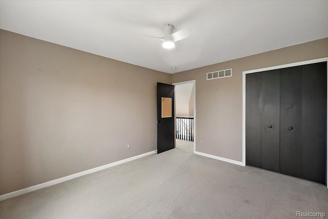 15924 Myrtle Dr, Macomb, MI 48042 - unfurnished bedroom featuring light carpet, a closet, and a ceiling fan
