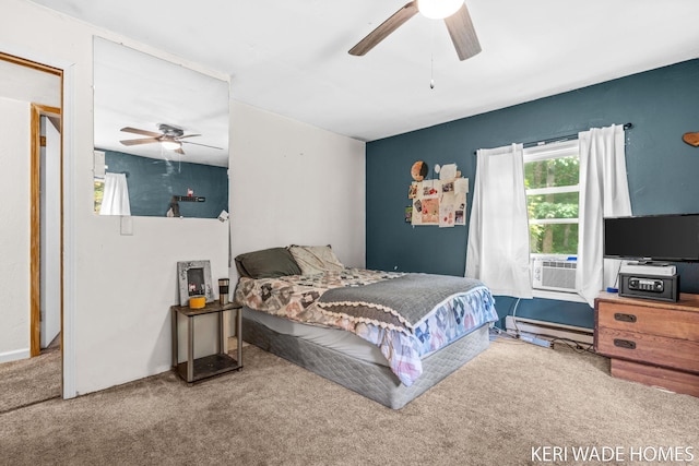 3231 E Baker Rd, Hesperia, MI 49421 - carpeted bedroom featuring a baseboard heating unit and a ceiling fan