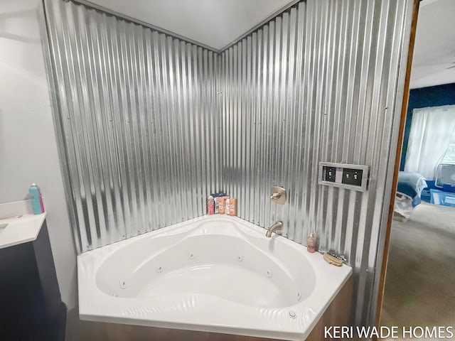 3231 E Baker Rd, Hesperia, MI 49421 - bathroom featuring a tub with jets