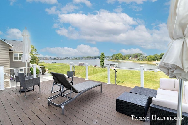 6129 W Bay Ct, Hudsonville, MI 49426 - deck with a water view and a lawn