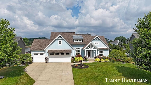 6129 W Bay Ct, Hudsonville, MI 49426 - craftsman inspired home featuring driveway, a front lawn, board and batten siding, a garage, and stone siding