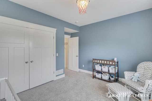 6129 W Bay Ct, Hudsonville, MI 49426 - sitting room with carpet floors and baseboards