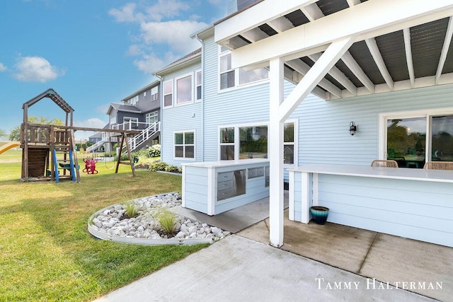 6129 W Bay Ct, Hudsonville, MI 49426 - view of patio / terrace with a playground