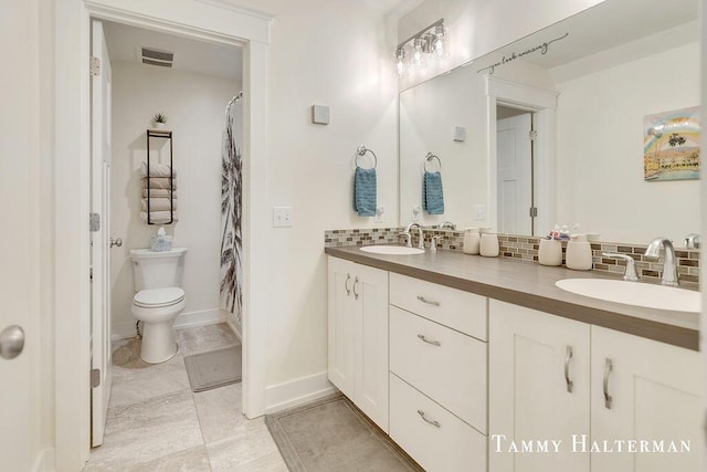 6129 W Bay Ct, Hudsonville, MI 49426 - full bathroom with tasteful backsplash and double vanity