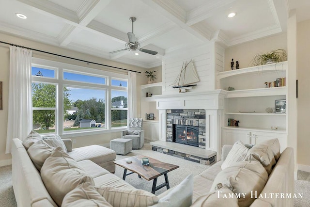 6129 W Bay Ct, Hudsonville, MI 49426 - living area with light colored carpet, coffered ceiling, ceiling fan, a fireplace, and beamed ceiling