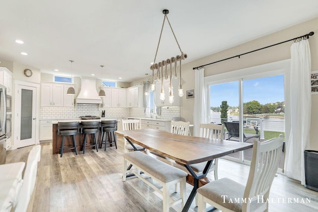 6129 W Bay Ct, Hudsonville, MI 49426 - dining room with light wood-style floors and recessed lighting