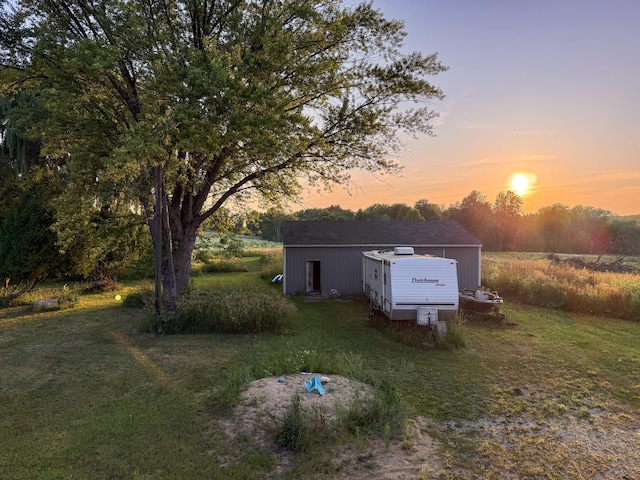 10677 Mason Dr, Grant, MI 49327 - view of grassy yard featuring an outbuilding