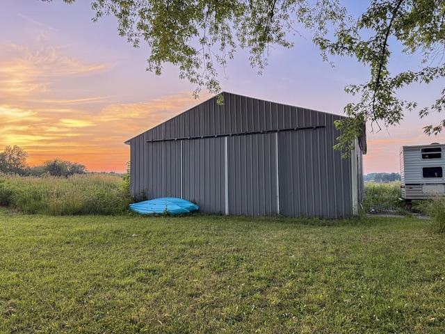 10677 Mason Dr, Grant, MI 49327 - view of pole building with a lawn