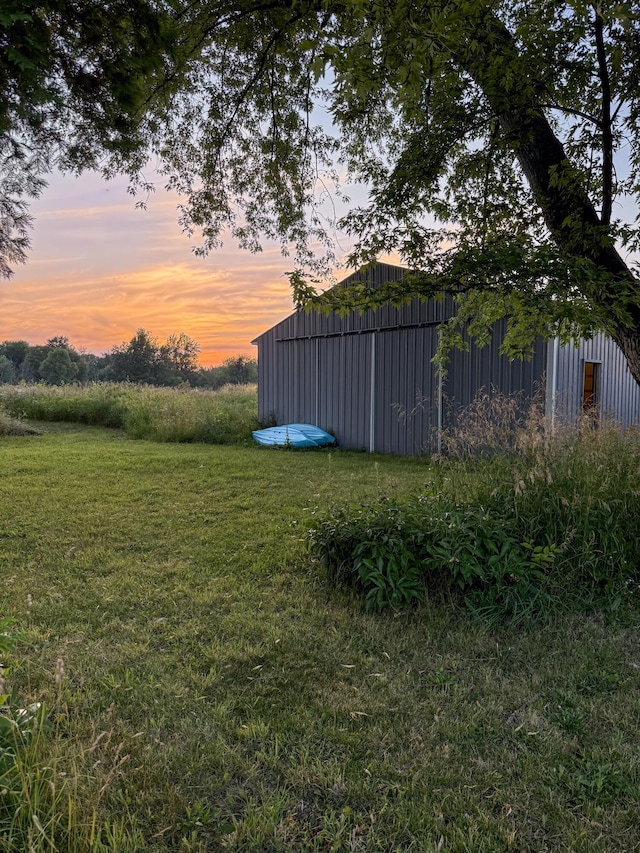 10677 Mason Dr, Grant, MI 49327 - view of grassy yard with a pole building and an outdoor structure