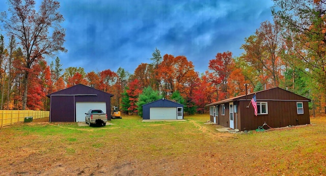 9279 S Forman Rd, Baldwin, MI 49304 - view of yard with a garage and an outdoor structure