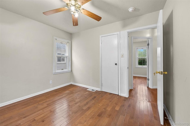 8460 Busko Ave, Utica, MI 48093 - unfurnished bedroom with wood-type flooring and ceiling fan