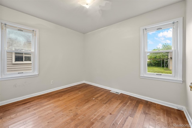 8460 Busko Ave, Utica, MI 48093 - empty room with hardwood / wood-style floors and baseboards