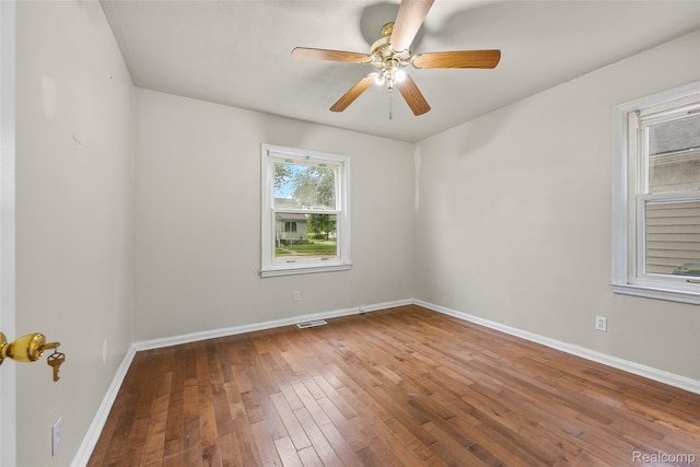 8460 Busko Ave, Utica, MI 48093 - unfurnished room featuring hardwood / wood-style flooring and a ceiling fan