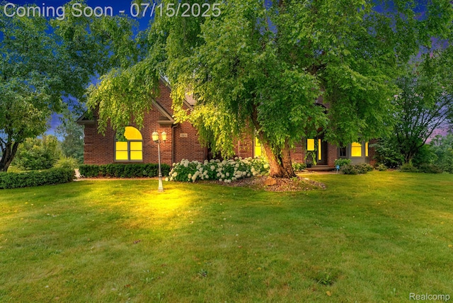 11656 Kings Colony, Grand Blanc, MI 48439 - view of front facade with a front yard and brick siding