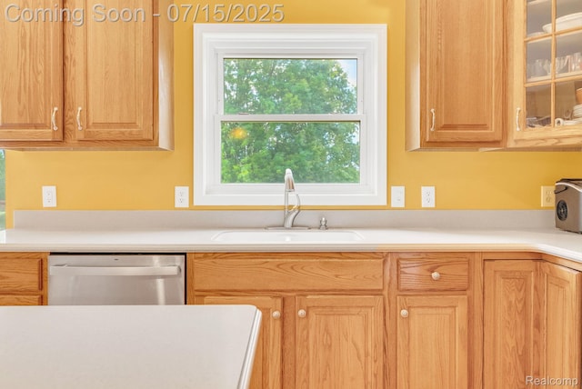 11656 Kings Colony, Grand Blanc, MI 48439 - kitchen with dishwasher, light countertops, and glass insert cabinets