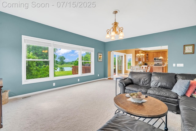 11656 Kings Colony, Grand Blanc, MI 48439 - living room featuring a chandelier and carpet flooring