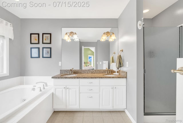 11656 Kings Colony, Grand Blanc, MI 48439 - full bath featuring tile patterned floors, a stall shower, double vanity, and a whirlpool tub
