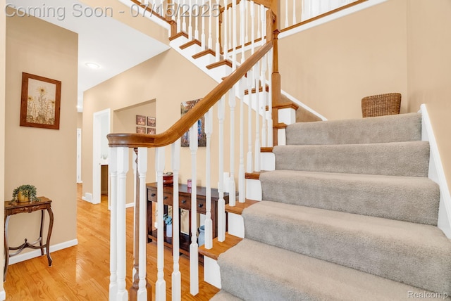 11656 Kings Colony, Grand Blanc, MI 48439 - staircase featuring wood finished floors and baseboards