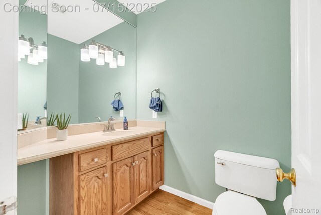 11656 Kings Colony, Grand Blanc, MI 48439 - half bath with vanity and wood finished floors