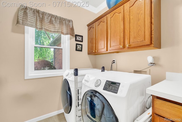 11656 Kings Colony, Grand Blanc, MI 48439 - washroom featuring cabinet space, washer and dryer, and light tile patterned flooring