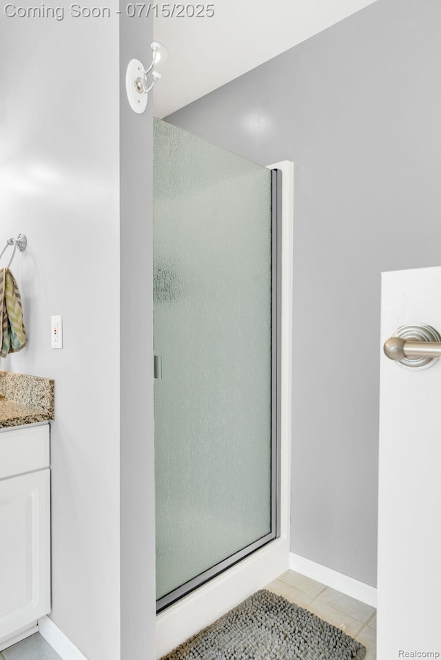 11656 Kings Colony, Grand Blanc, MI 48439 - full bath featuring a shower stall, tile patterned floors, and vanity
