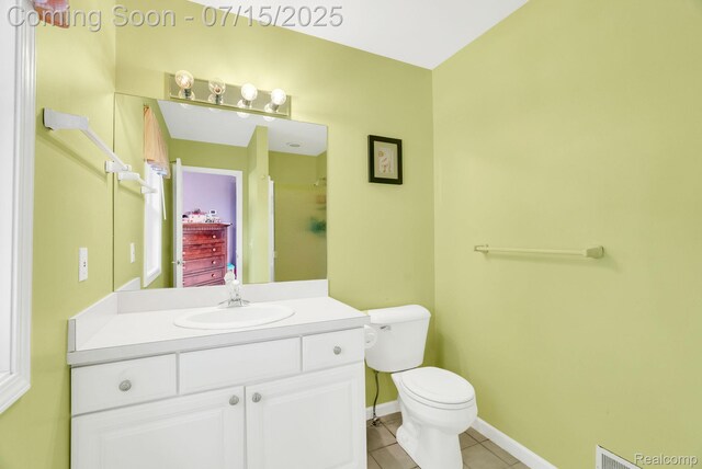 11656 Kings Colony, Grand Blanc, MI 48439 - bathroom featuring tile patterned flooring, vanity, and a shower