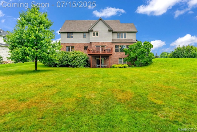 11656 Kings Colony, Grand Blanc, MI 48439 - back of property featuring brick siding, a yard, and a deck