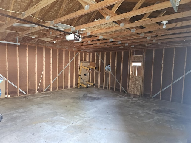 3521 Henderson Rd, Spring Arbor, MI 49283 - miscellaneous room featuring a garage and concrete flooring