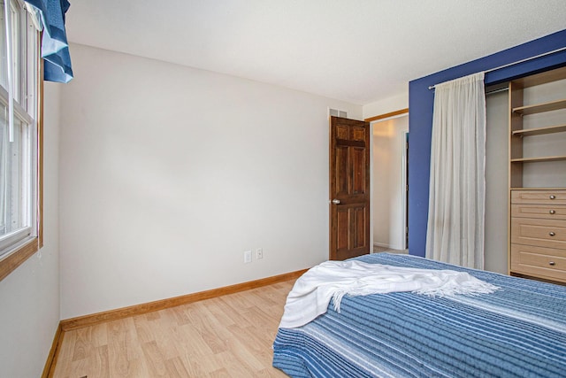275 W State St, Coldwater, MI 49036 - bedroom featuring wood finished floors and baseboards