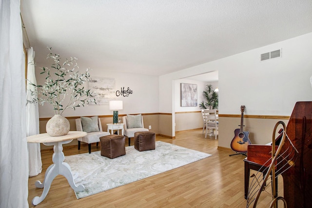275 W State St, Coldwater, MI 49036 - sitting room featuring wood finished floors