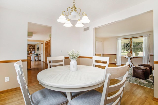 275 W State St, Coldwater, MI 49036 - dining room with a chandelier and light wood finished floors
