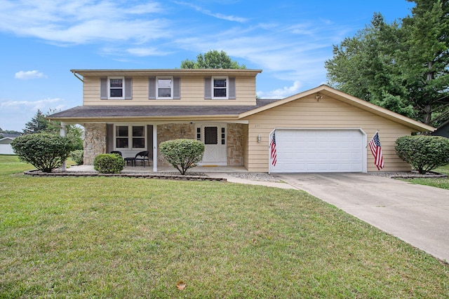 275 W State St, Coldwater, MI 49036 - traditional-style home featuring stone siding, covered porch, a garage, concrete driveway, and a front lawn