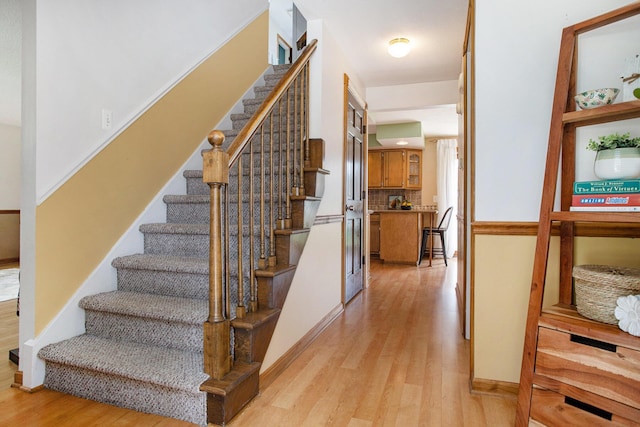 275 W State St, Coldwater, MI 49036 - stairs featuring wood finished floors