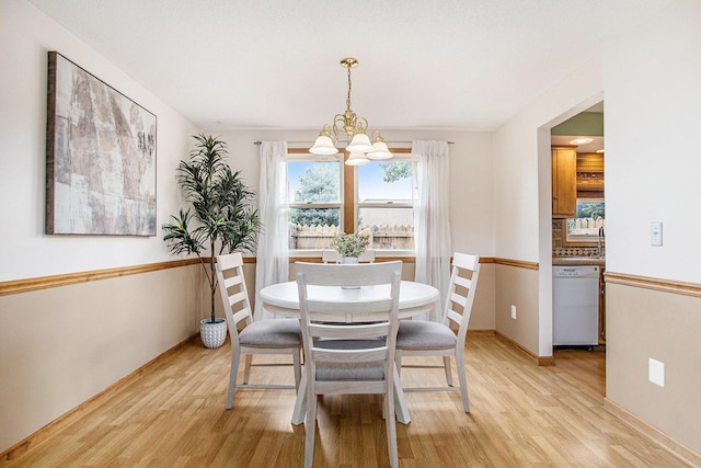 275 W State St, Coldwater, MI 49036 - dining area with a chandelier and light wood finished floors