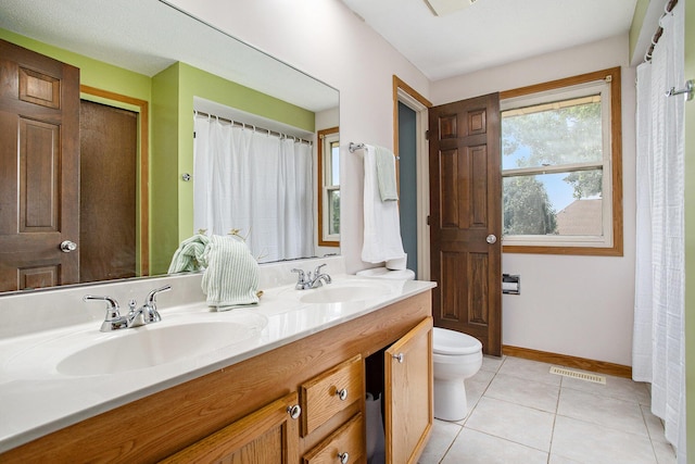 275 W State St, Coldwater, MI 49036 - full bath with double vanity and tile patterned flooring