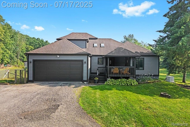 61353 W 8 Mile Rd, South Lyon, MI 48178 - view of front of property featuring asphalt driveway, a front yard, a shingled roof, and a wooden deck