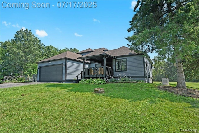 61353 W 8 Mile Rd, South Lyon, MI 48178 - single story home with a front lawn, driveway, a garage, and a porch