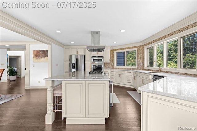 61353 W 8 Mile Rd, South Lyon, MI 48178 - kitchen with light stone countertops, backsplash, stainless steel appliances, island range hood, and dark wood-type flooring