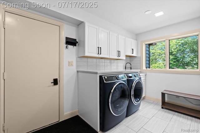 61353 W 8 Mile Rd, South Lyon, MI 48178 - laundry area with cabinet space and washing machine and clothes dryer
