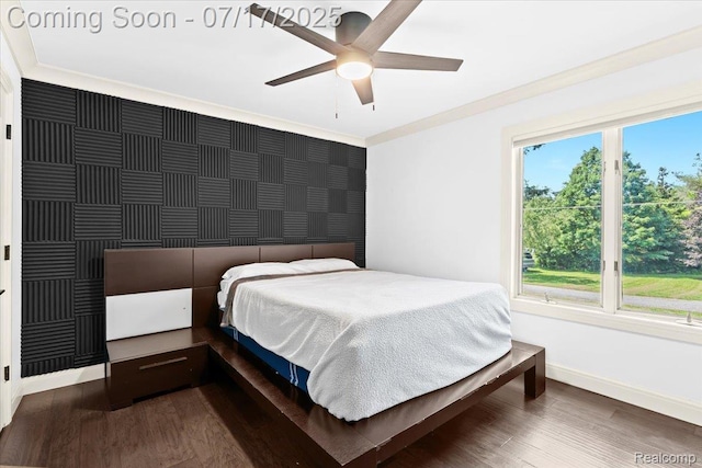 61353 W 8 Mile Rd, South Lyon, MI 48178 - bedroom with wood finished floors, an accent wall, and a ceiling fan
