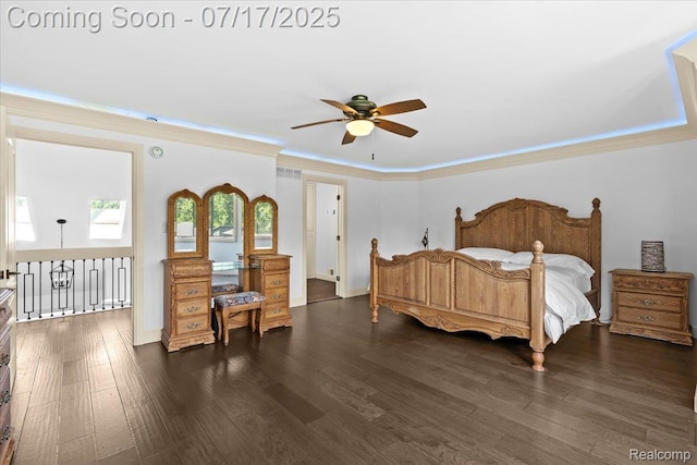 61353 W 8 Mile Rd, South Lyon, MI 48178 - bedroom with dark wood-style floors, ornamental molding, and a ceiling fan