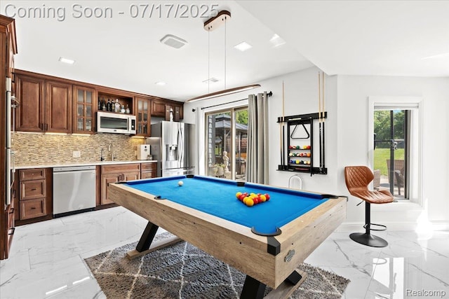 61353 W 8 Mile Rd, South Lyon, MI 48178 - rec room featuring bar with sink, light marble finish flooring, and billiards table