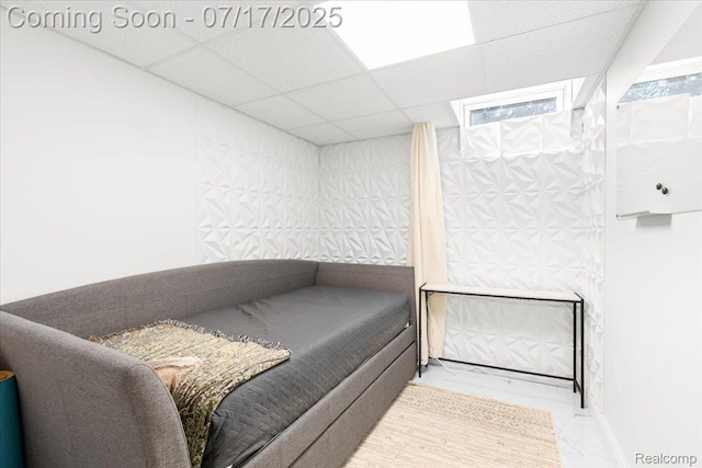 61353 W 8 Mile Rd, South Lyon, MI 48178 - bedroom featuring a drop ceiling and marble look tiles