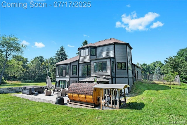 61353 W 8 Mile Rd, South Lyon, MI 48178 - back of property featuring a hot tub and a patio area